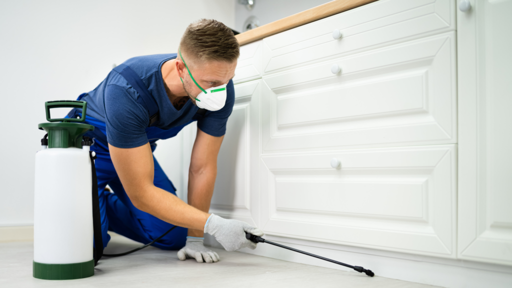 HVAC technician servicing air conditioning unit